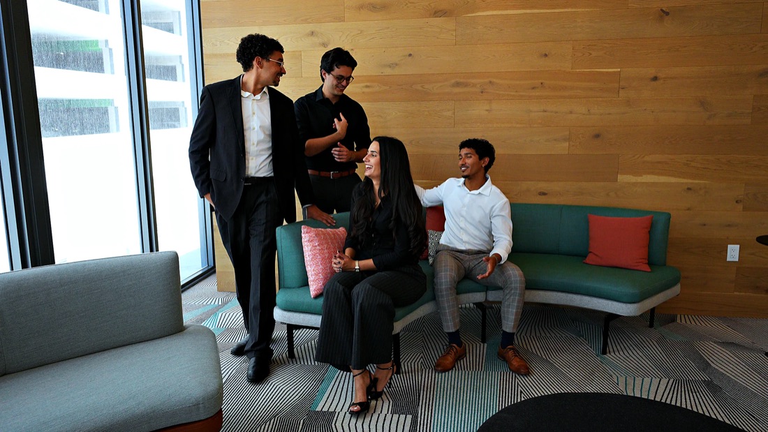 The Button Up Media team together at their Miami office