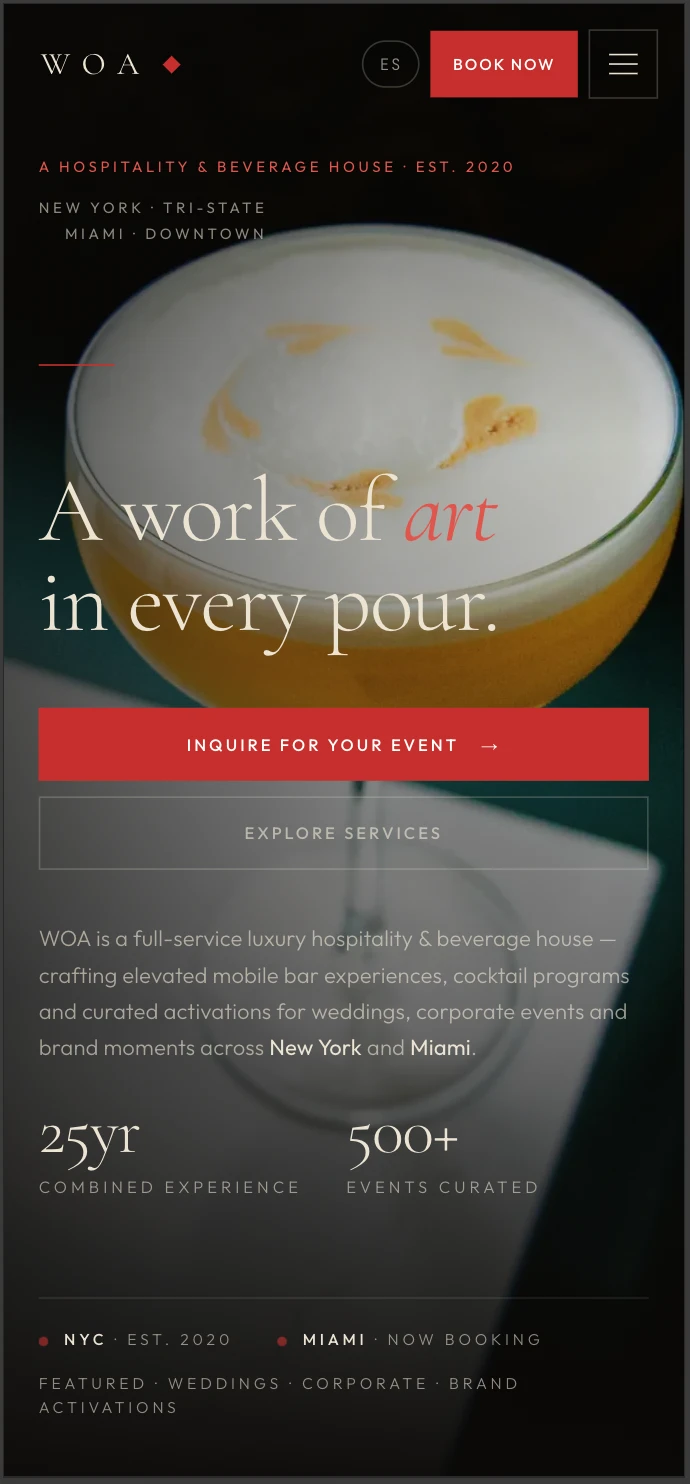 The WOA Cocktails website shown on a mobile phone